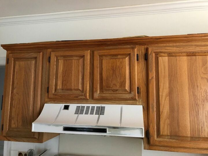 q how to refinish kitchen cabinets