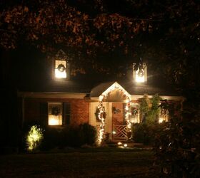25 great ideas to improve your curb appeal in a weekend, Light the Way to Your Family Home for Christmas Curb Appeal
