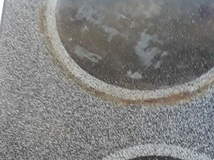 q how do i get plastic off a glass top stove burner