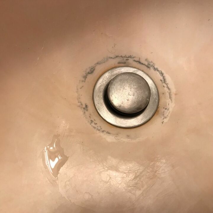 q how do i remove this embedded stain from bathroom sink