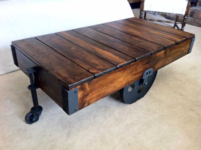 17 diy coffee table ideas to transform your living space, This DIY Rustic Coffee Table Was Made Using a Factory Cart
