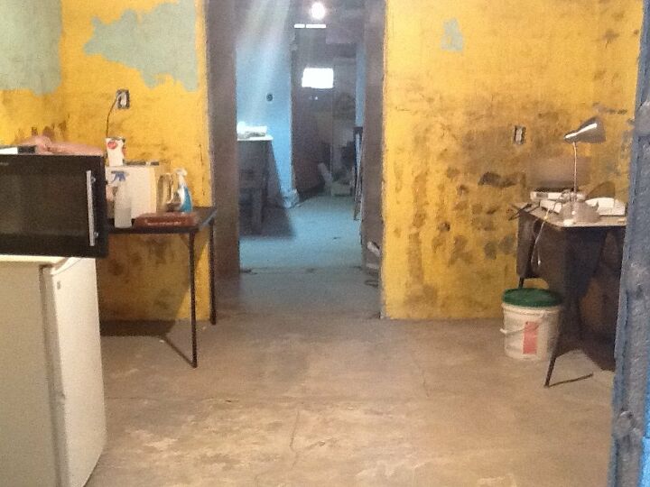 q how to remove dark spot from a brick wall in kitchen