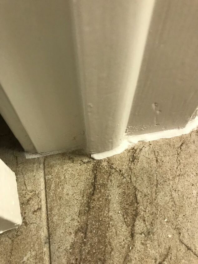 how do i repair caulk between the floor tile and the baseboard