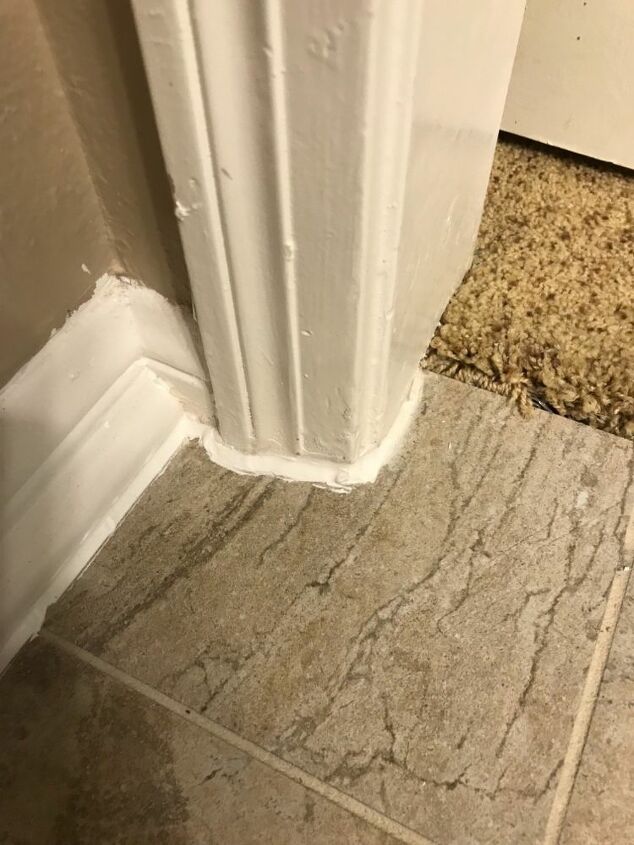 how do i repair caulk between the floor tile and the baseboard