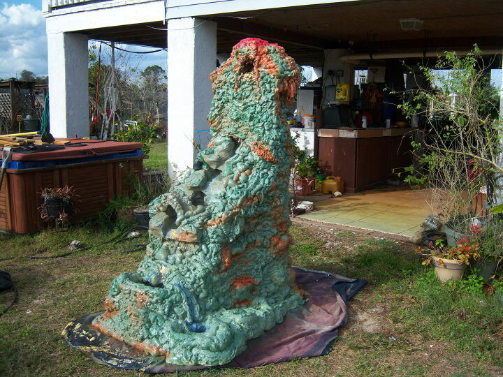 14 cute fairy garden ideas that will bring some magic to your garden, A Wonderous Fairy Garden Waterfall