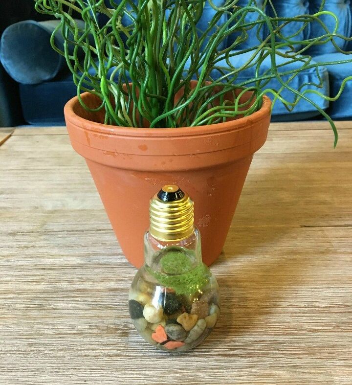 14 cute fairy garden ideas that will bring some magic to your garden, A Bright Idea Fairy Gardens in a Lightbulb