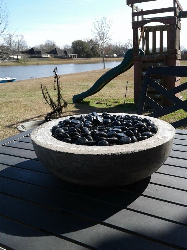 11 fantastic fire pit ideas to heat up your yard, A Crafty Concrete Fire Pit
