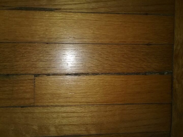 q how do i fill spaces between the wood in my hardwood floors