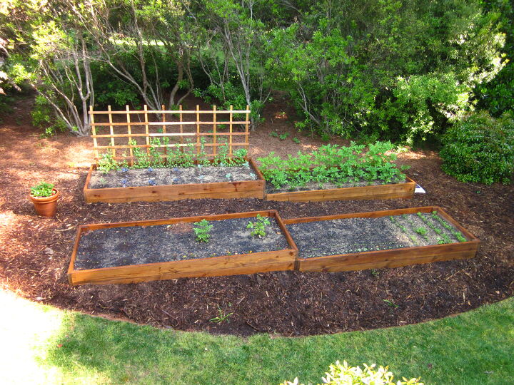 diy raised garden bed ideas to transform your garden space, Raised Beds For Sloping Gardens