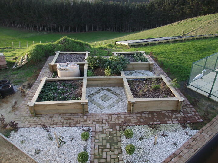 diy raised garden bed ideas to transform your garden space, Adding Geometric Design Flourishes