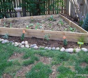 diy raised garden bed ideas to transform your garden space, The Answer To Odd Shaped Space In Your Garden
