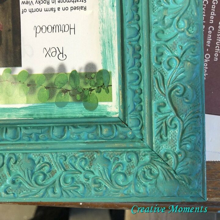 espejo ornamentado en verde azulado