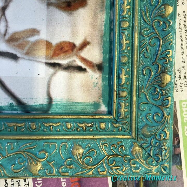 espejo ornamentado en verde azulado