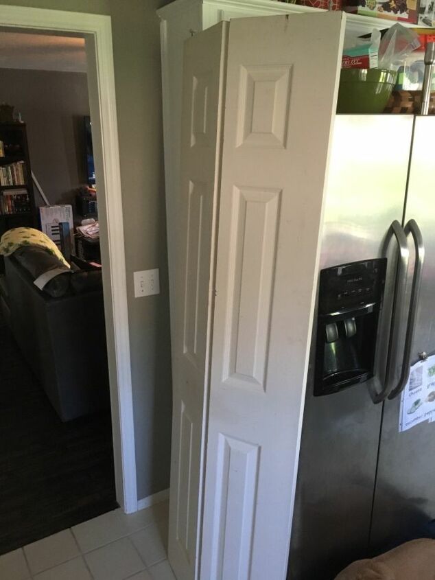 faux wood painting on hollow core doors, Bi fold Pantry Door