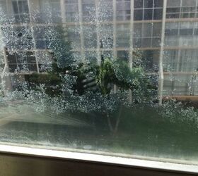 q how to take off glue residue from windows after taking off plastic