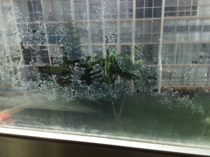 q how to take off glue residue from windows after taking off plastic