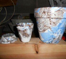 s 10 stunning marble makeovers, Marbling Flower Pots With Spray Paint