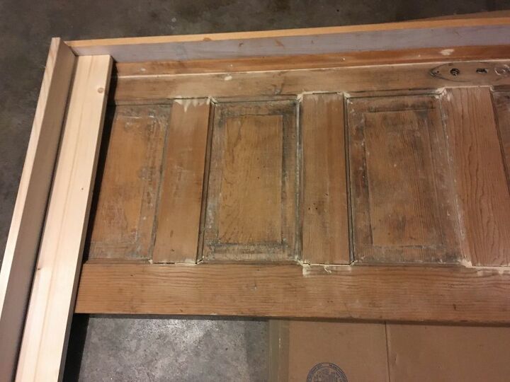 a reclaimed door becomes a farmhouse headboard