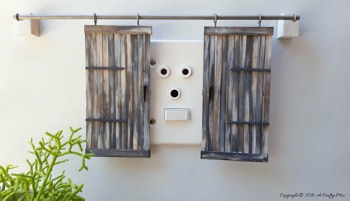 20 diy ideas to help you build your perfect barn door, Miniature Barn Doors to Conceal Wall Sockets