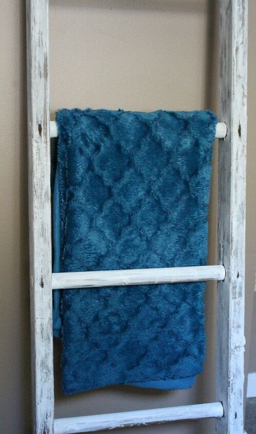 15 brilliant blanket ladder ideas to help you hang anything in style, Delightful Blanket Ladder Decoration