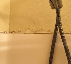 how do i repair the wall above a shower enclosure