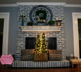 17 facelift ideas for a fireplace remodel in your home, A Lick of Paint on a Bricked Fireplace Gives Farmhouse Inspiration