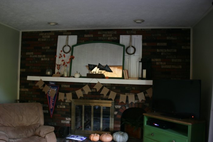 17 facelift ideas for a fireplace remodel in your home, Repainting the Grout of This Fireplace Surround Adds Fresh Definition