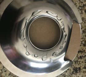 She squeezes glue on an extra stove burner cover for this cute kitchen idea