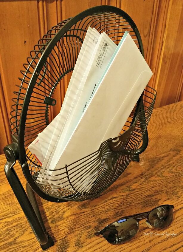 how to make a mail organizer to de clutter your counter tops, Turn an Old Fan into a Mail Organizer