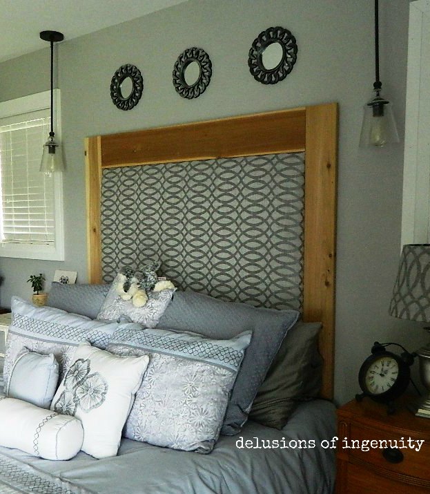21 diy headboard ideas designed to spruce up your bedroom, Upholstered Headboard Made From Curtain Panels