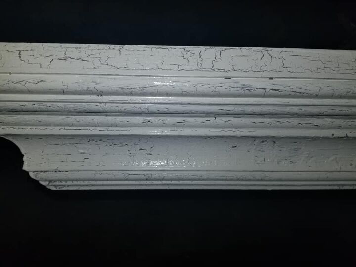 a reclaimed door becomes a farmhouse headboard, brown basecoat below crackle coat and white