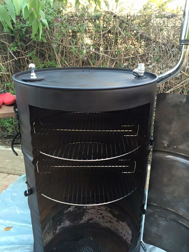 s 18 projects to prepare your outdoor space for summer, Use old barrels to create a BBQ smoker
