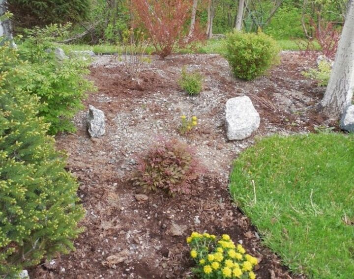 s 18 projects to prepare your outdoor space for summer, Use mulch to solve your garden problems