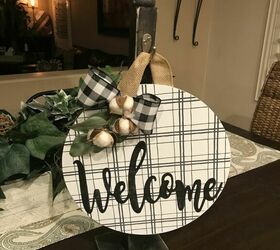 diy decor using dollar store items that you can make this weekend, Wooden charger makes a unique welcome sign