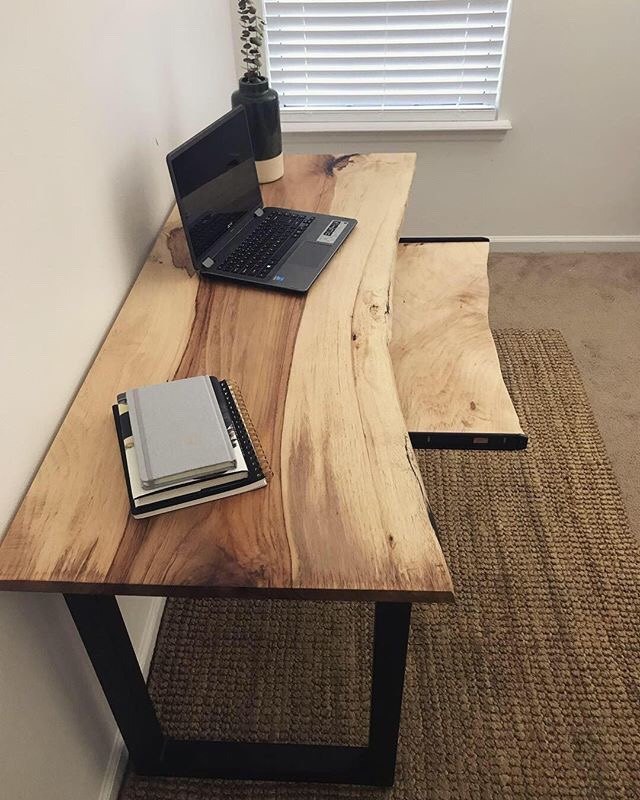 s 12 desks that will keep you organized, A live edge desk with rolling keyboard shelf