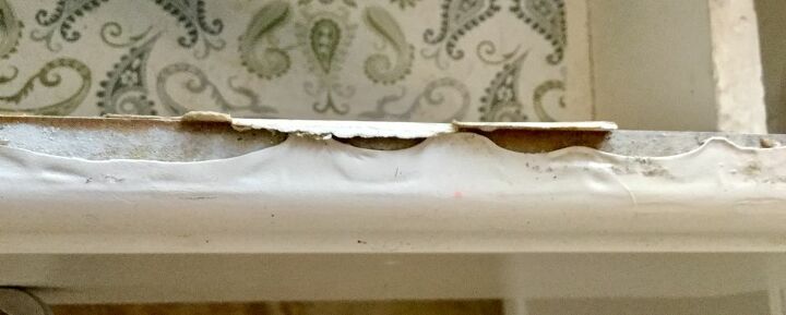 how does one deal with peeling thermolite covered kitchen cupboards