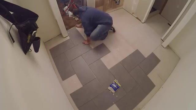 remodelling the old nasty carpeted bathroom floor
