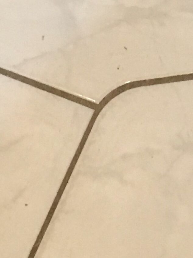 q how do i clean the grout in my tile floor