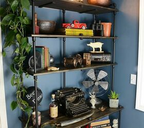 14 fantastic ways to make pipe shelves work for your home decor, Brilliant Black Pipe Shelves