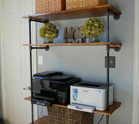 14 fantastic ways to make pipe shelves work for your home decor, Magically Modern Pipe Shelves