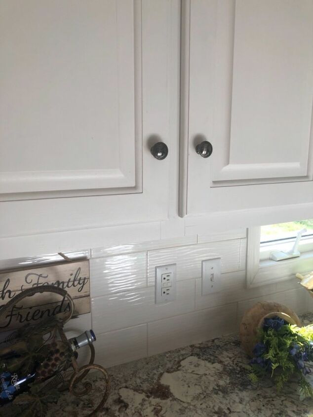 q we just installed granite which we love and backsplash cabinets are