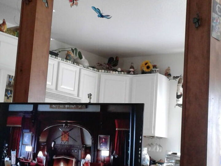 q how do we make a open faux window behind tv less open
