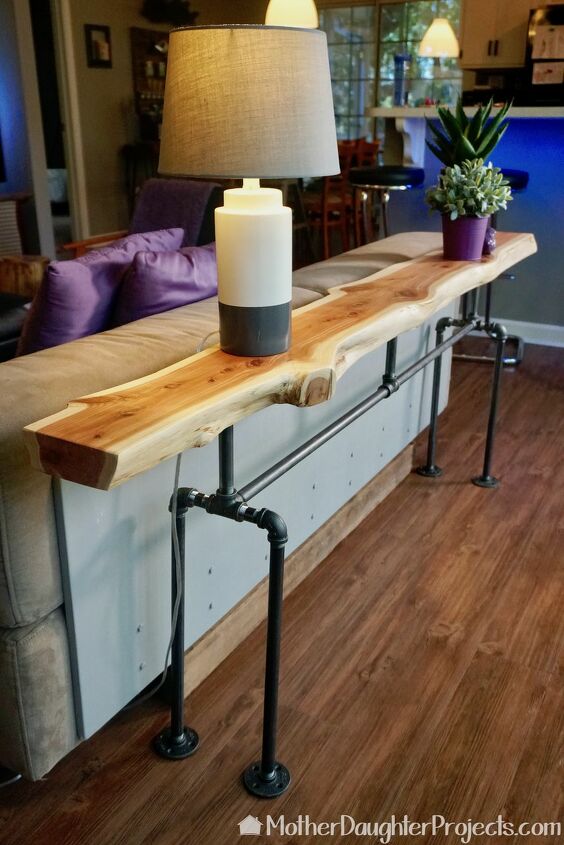 17 natural live edge wood projects to add authenticity to your home, Live Edge Table With Industrial Pipework Legs