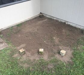how to make a quick easy diy backyard deck for grilling, Dropping 4x4s into the hole and adding cement
