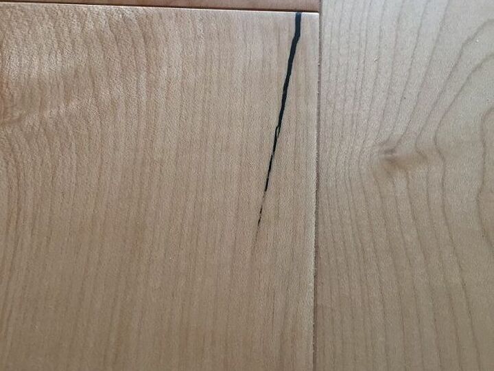 q how do i remove sharpie from wood floor