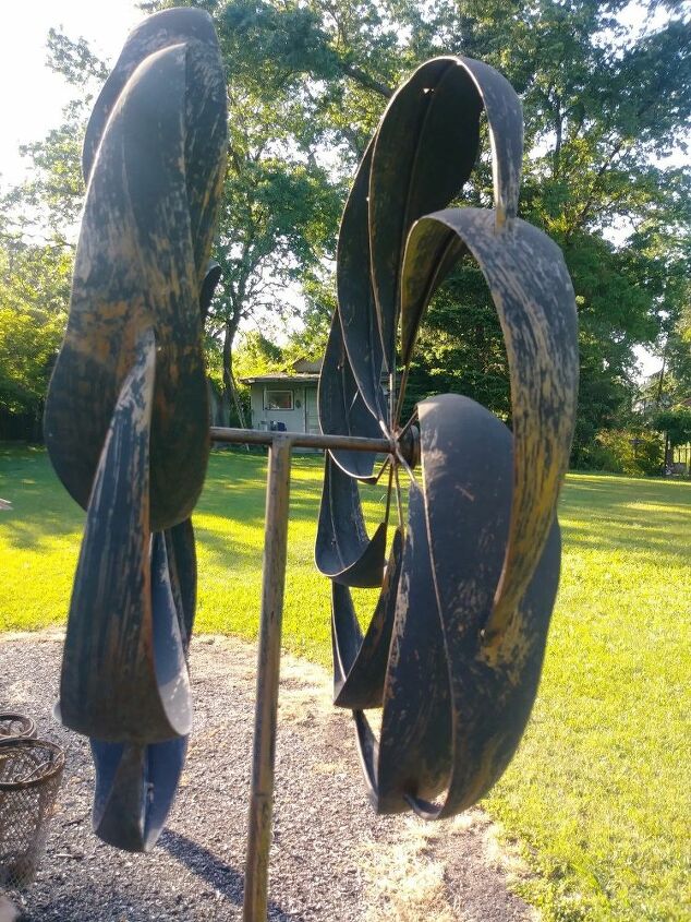 how do i clean the black ick off a faux copper kinetic yard sculpture