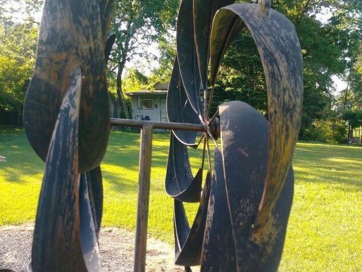 q how do i clean the black ick off a faux copper kinetic yard sculpture