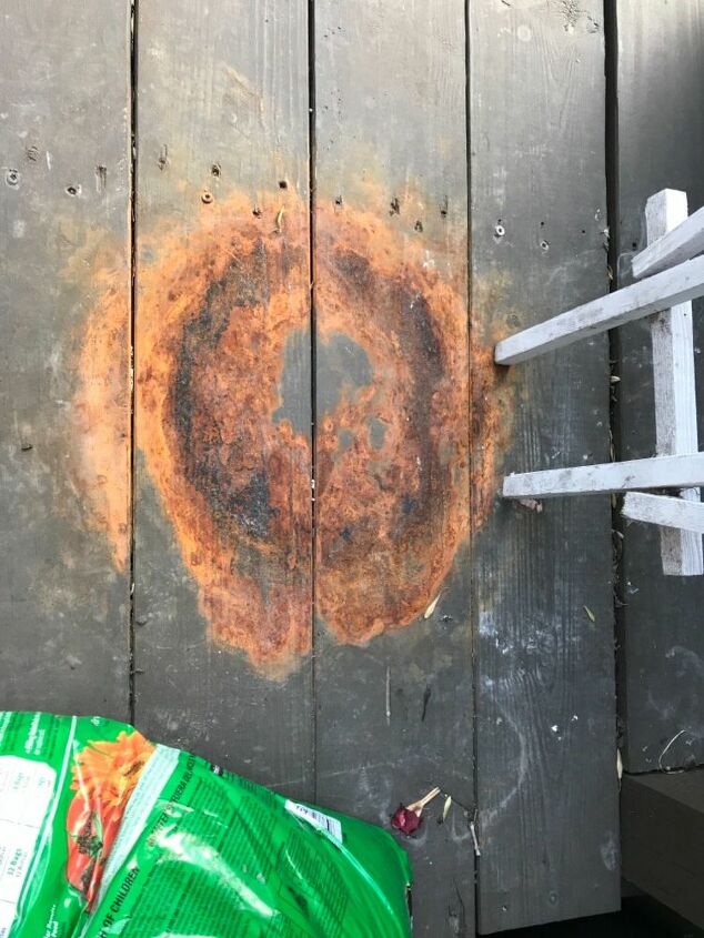 how do i remove a rust stain from a wooden deck
