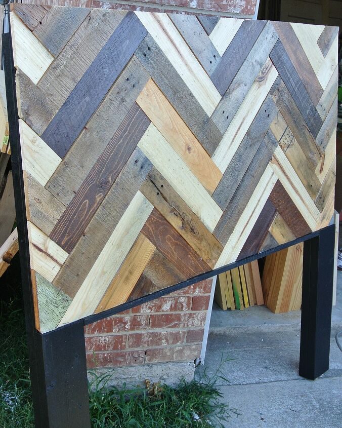 12 striking pallet bed projects for the perfect nights sleep, A Chevron Patterned Headboard