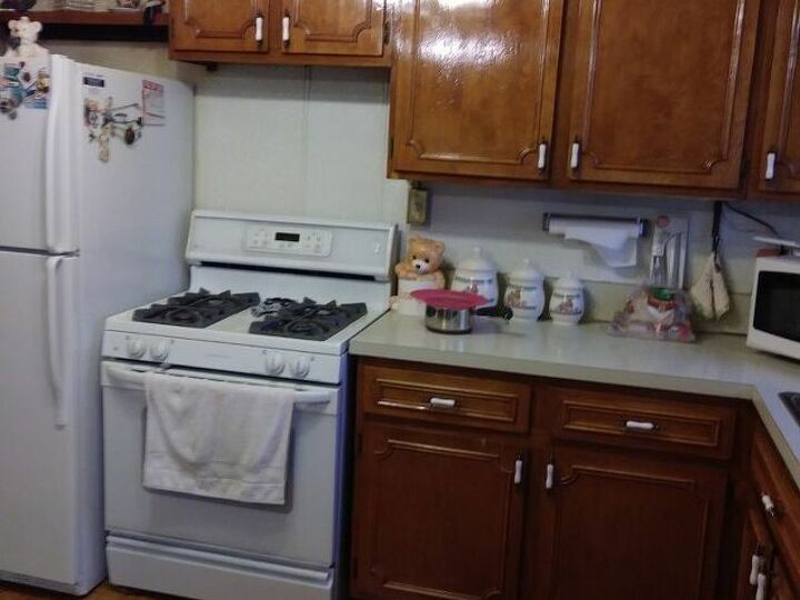 q is there any way that i can restain these cabinets myself